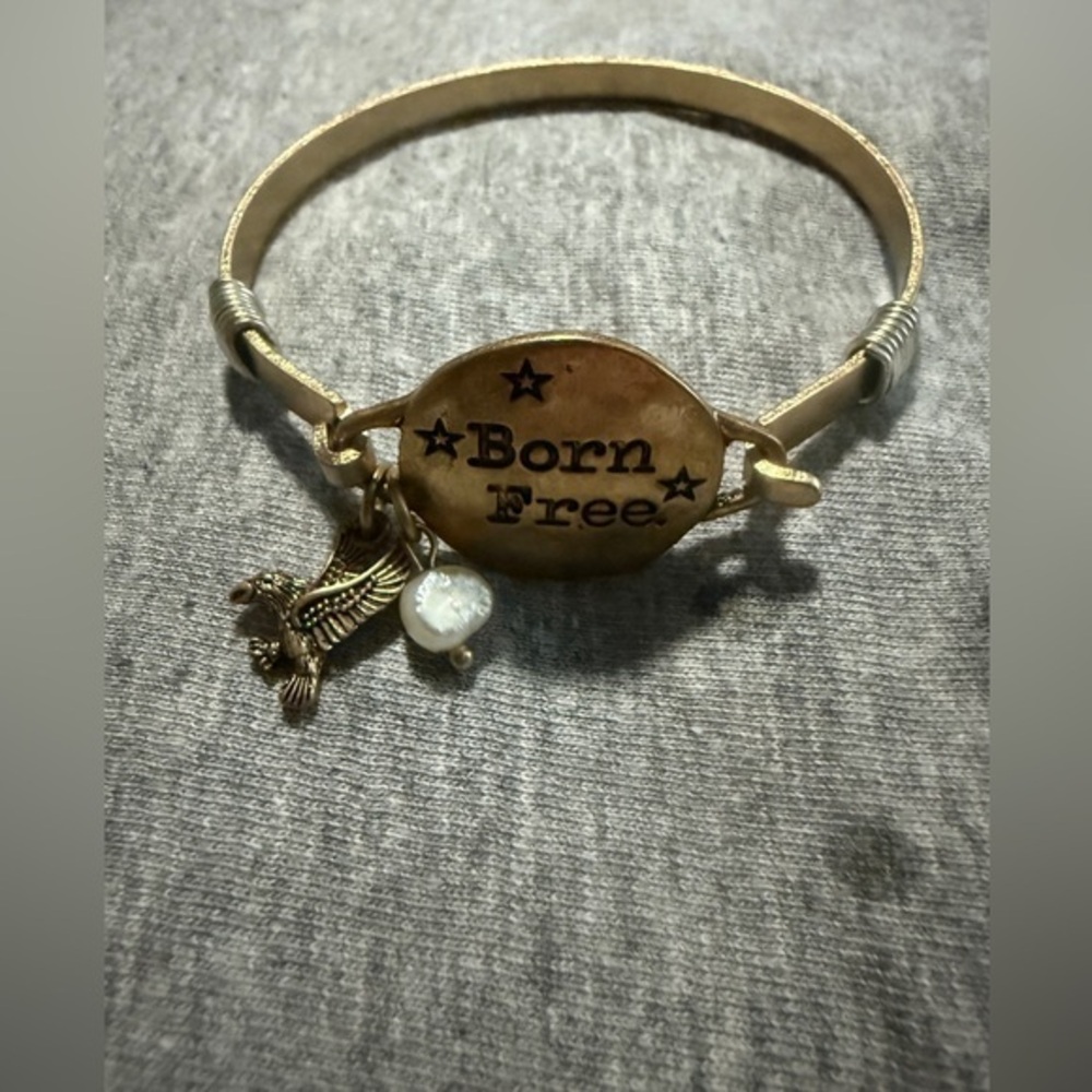 Gold 'Born Free' Bracelet with Charms